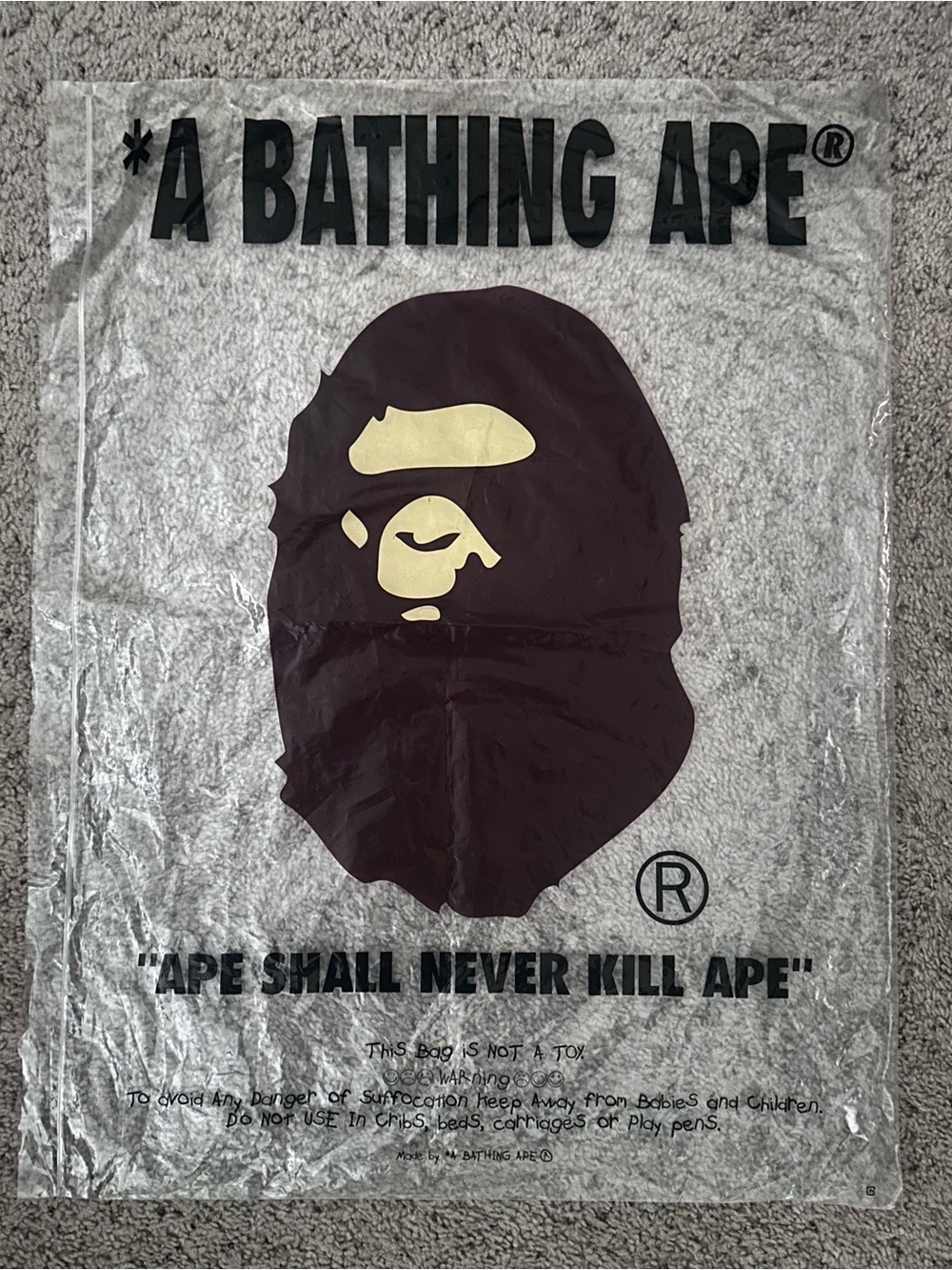 A Bathing Ape Reflective Jacket in Silver & Black. Size M
